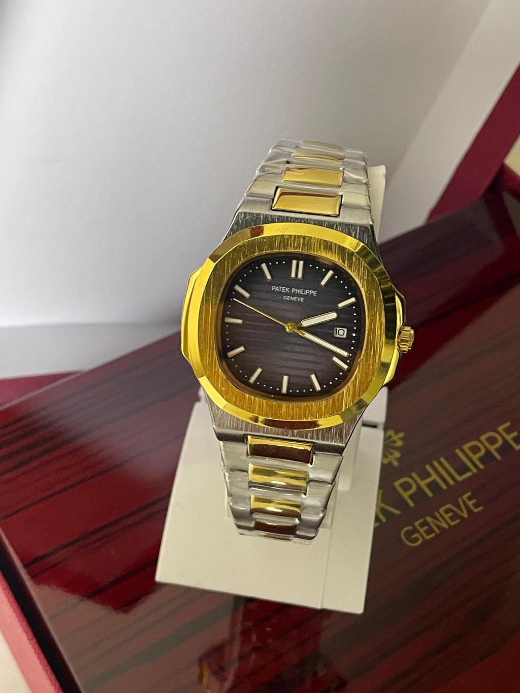 Luxury Patek Philippe Nautilus Two-Tone Watch - Black Dial with Gold Accents