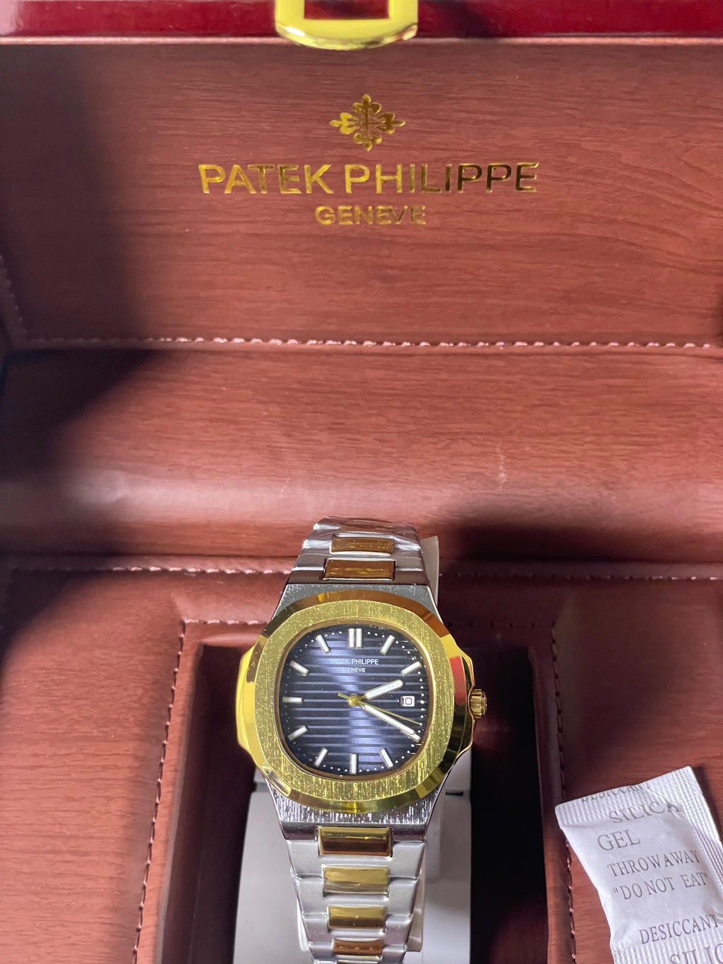 Luxury Patek Philippe Nautilus Two-Tone Watch - Black Dial with Gold Accents